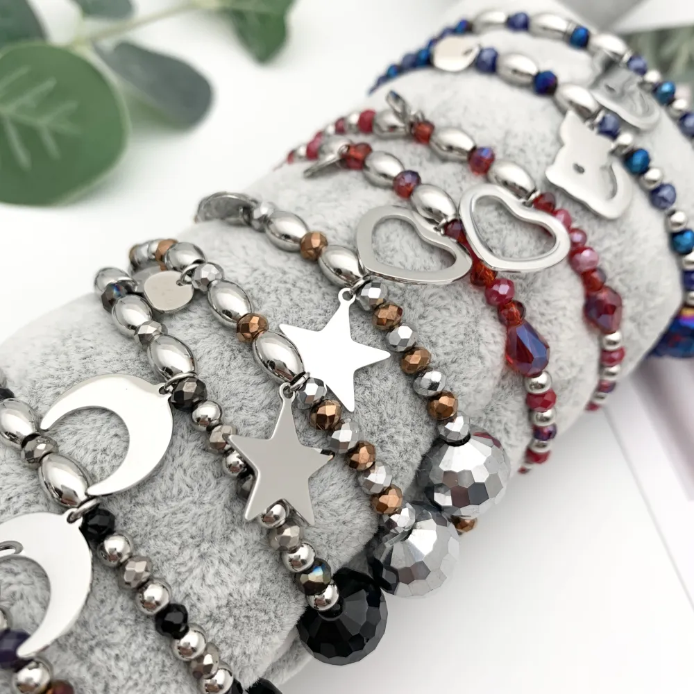 12Pz Bracciali Elastici in Acciaio+Cuscino in Omaggio - BPA7678-Mix Soggetti-12 Pz Bracciali in Acciaio