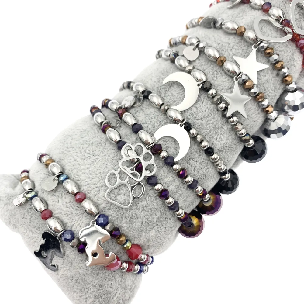 12Pz Bracciali Elastici in Acciaio+Cuscino in Omaggio - BPA7678-Mix Soggetti-12 Pz Bracciali in Acciaio