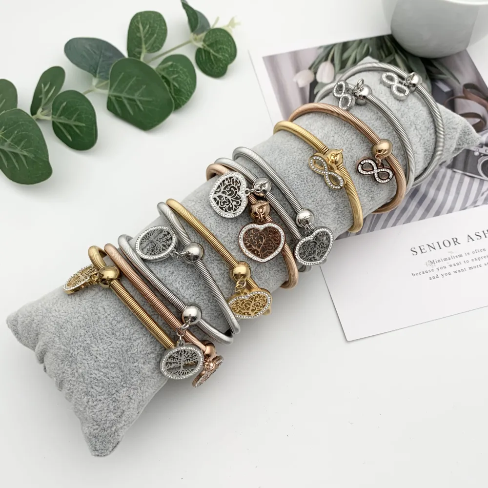 12Pz Bracciali Elastici in Acciaio+Cuscino in Omaggio - BPA7667-Mix Con Strass-12 Pz Bracciali in Acciaio