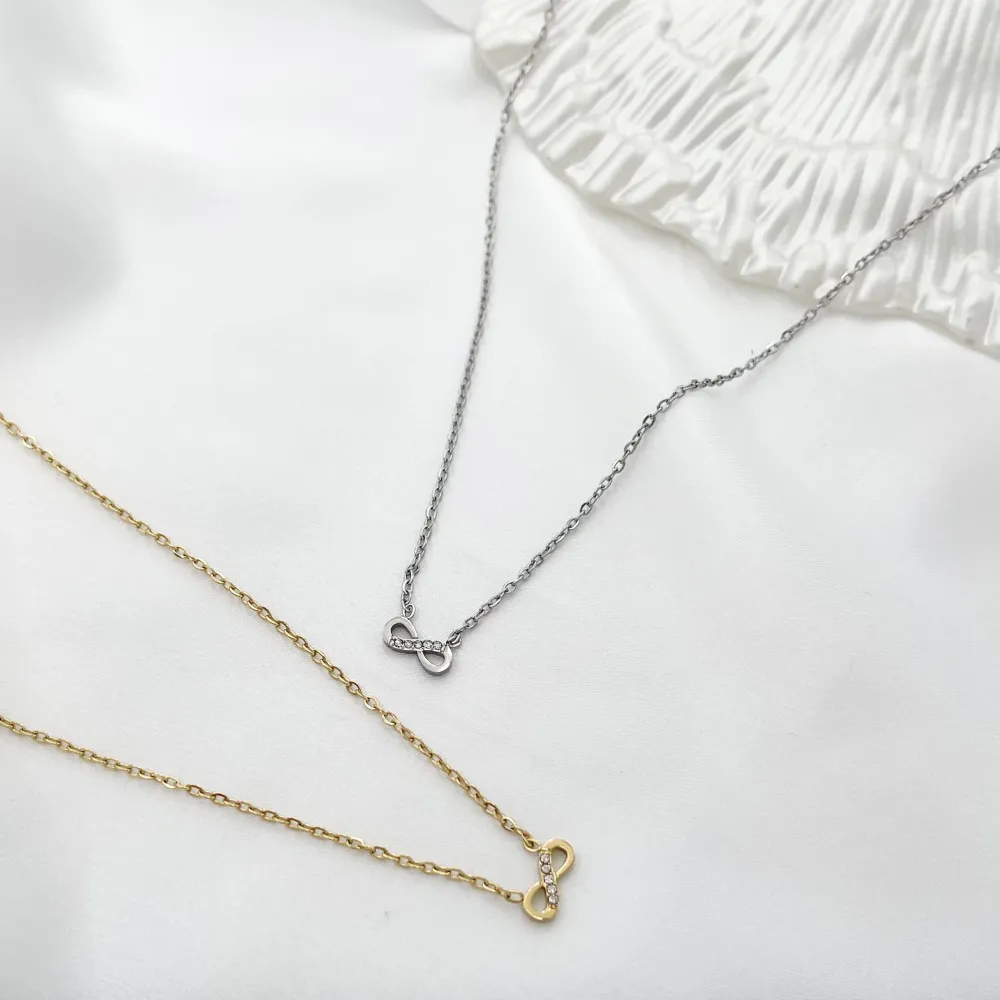 Infinito con Zirconia-Collana Corta in Acciaio - CAC-103-AA575N (Oro Giallo)